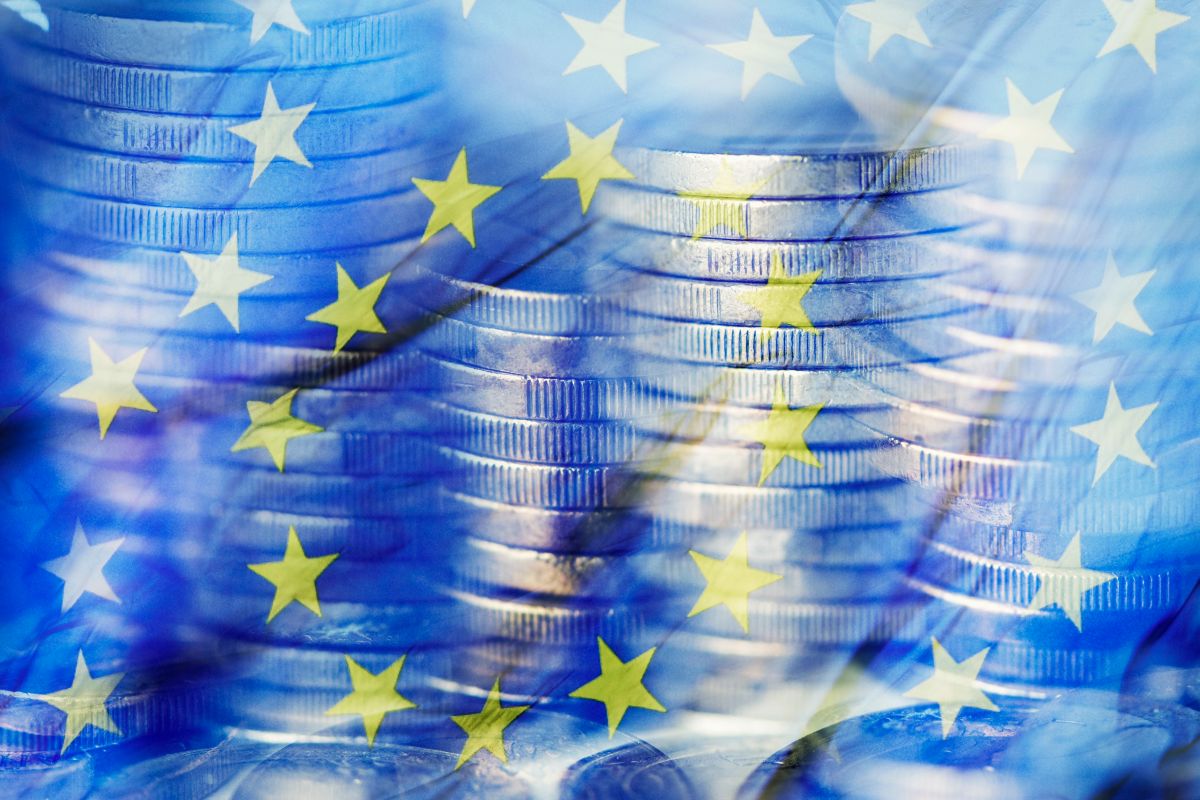 A,Multiple,Exposure,Of,Some,Piles,Of,Euro,Coins,And