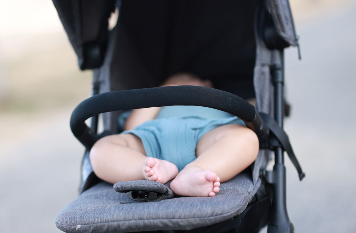 Baby,Is,Sleeping,In,A,Baby,Stroller,On,The,Beach