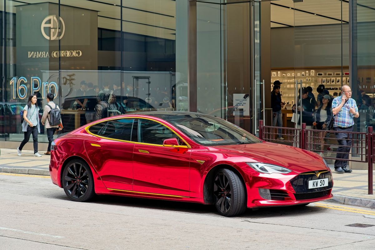 Red,Tesla,On,The,Street,In,Hong,Kong,,China,25.10.2024