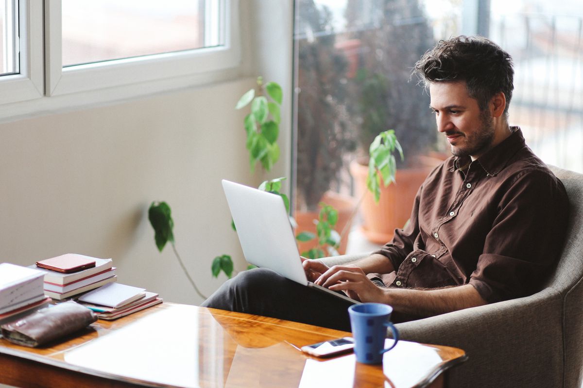 Young man working at home