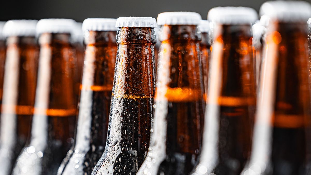 Row,Cold,Ice,Beer,Bottles,With,Drops,Of,Water,Against haggenmacher dreher