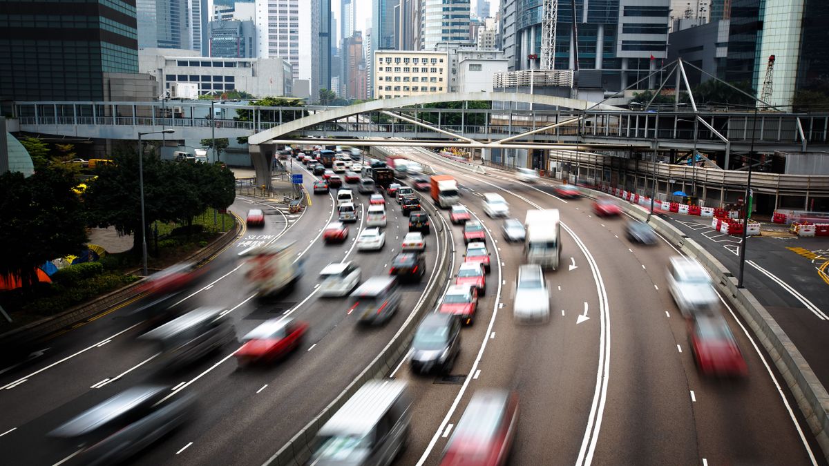 kínai gazdaság Cars,In,Motion,Blur,On,Road,Hong,Kong,China