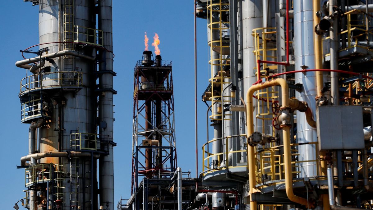 A flame burns from a tower at Hungarian MOL Group's Danube Refinery in Szazhalombatta dunai finomító