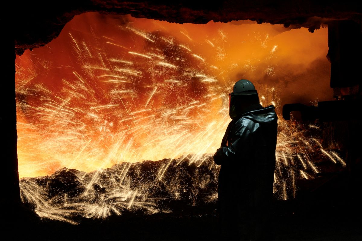 FILE PHOTO: Steel worker at furnace of ThyssenKrupp's steel plant in Duisburg