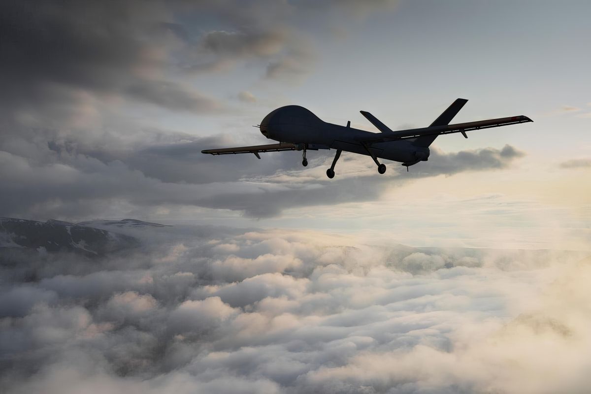 Silhouette,Of,A,Military,Attack,Drone,Flying,In,The,Sky
