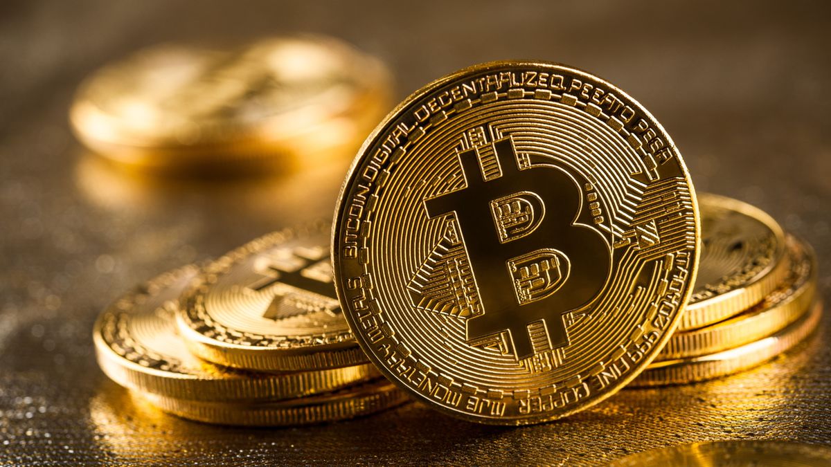 Satoshi Nakamoto, Gold,Bitcoins,On,Glittering,Background,,Close,Up