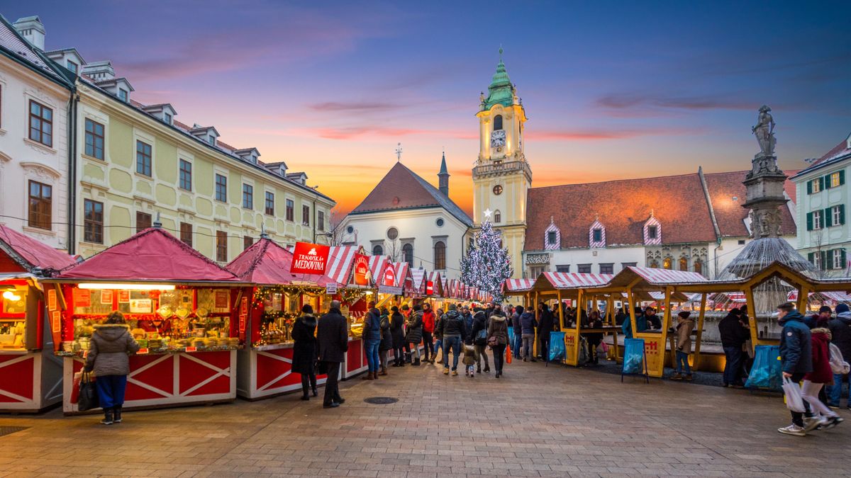 karácsonyi,Christmas,Market,In,Bratislava,Main,Square,At,Sunset,,Slovakia,,December-22-2015
