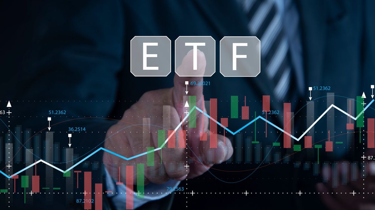 Businessman,Pointing,At,Etf,(exchange,Traded,Funds).,Investment,Opportunities,In