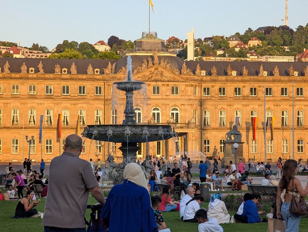People Cooling Off At Palace Fountain In Stuttgart