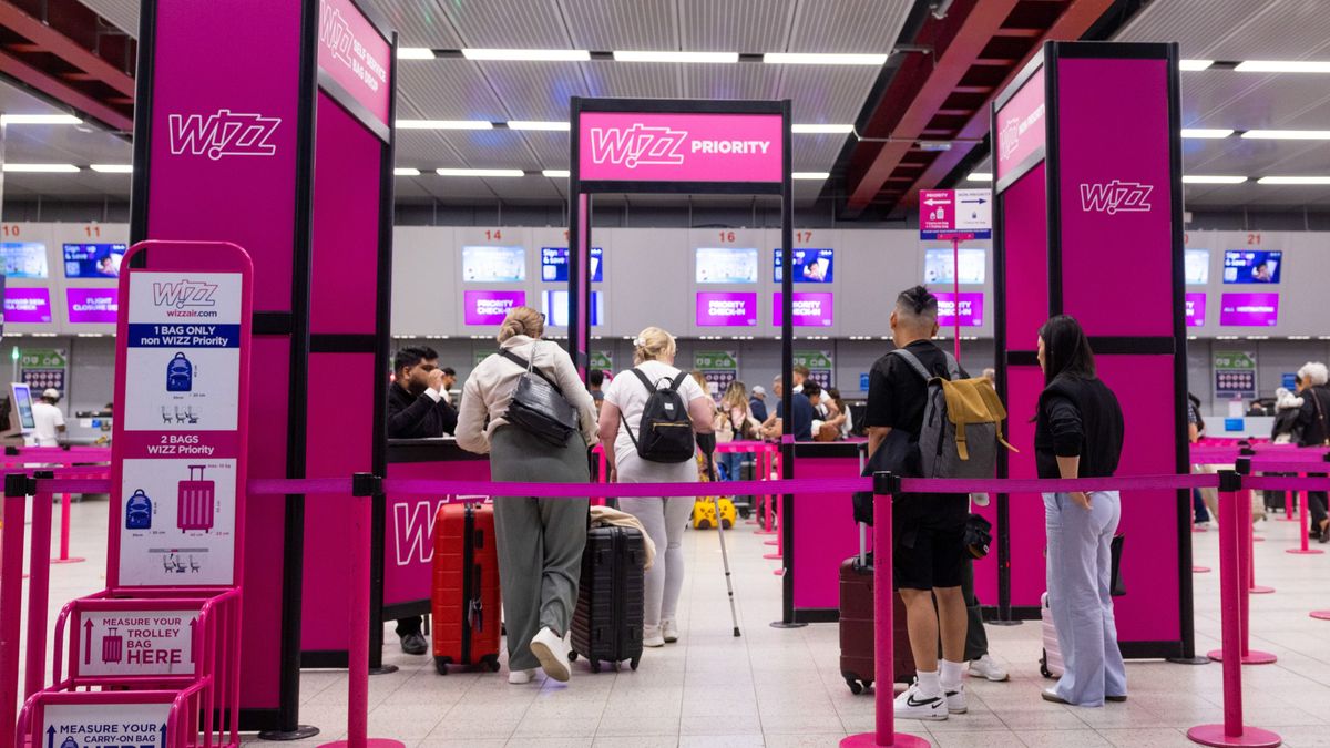 A Wizz Air check in area at London Luton Airport. wizz air