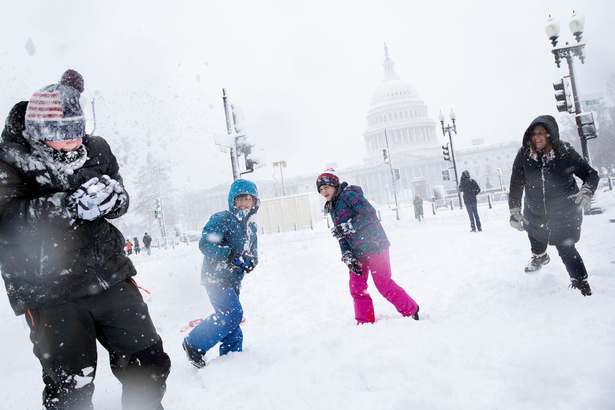 Snow falls during a winter storm on Capitol Hill in Washington