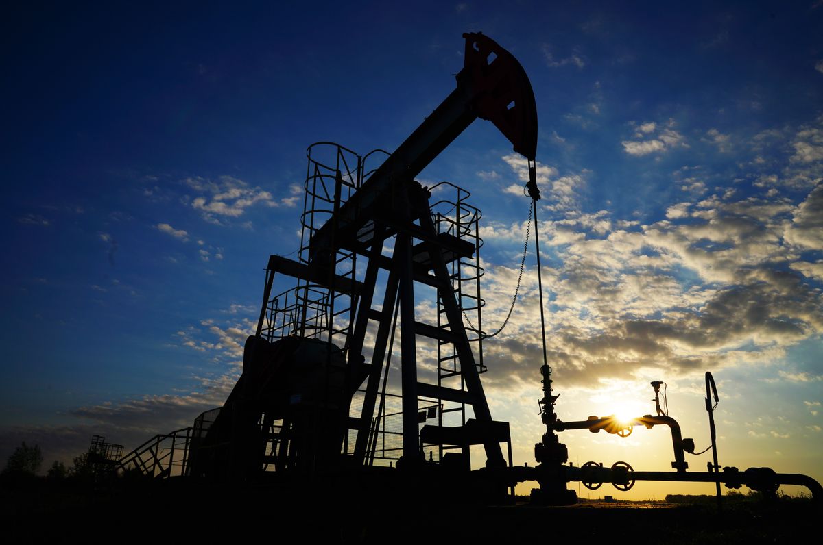 Pumpjack,In,Oil,Well,Of,Oil,Field,On,Sunset,In