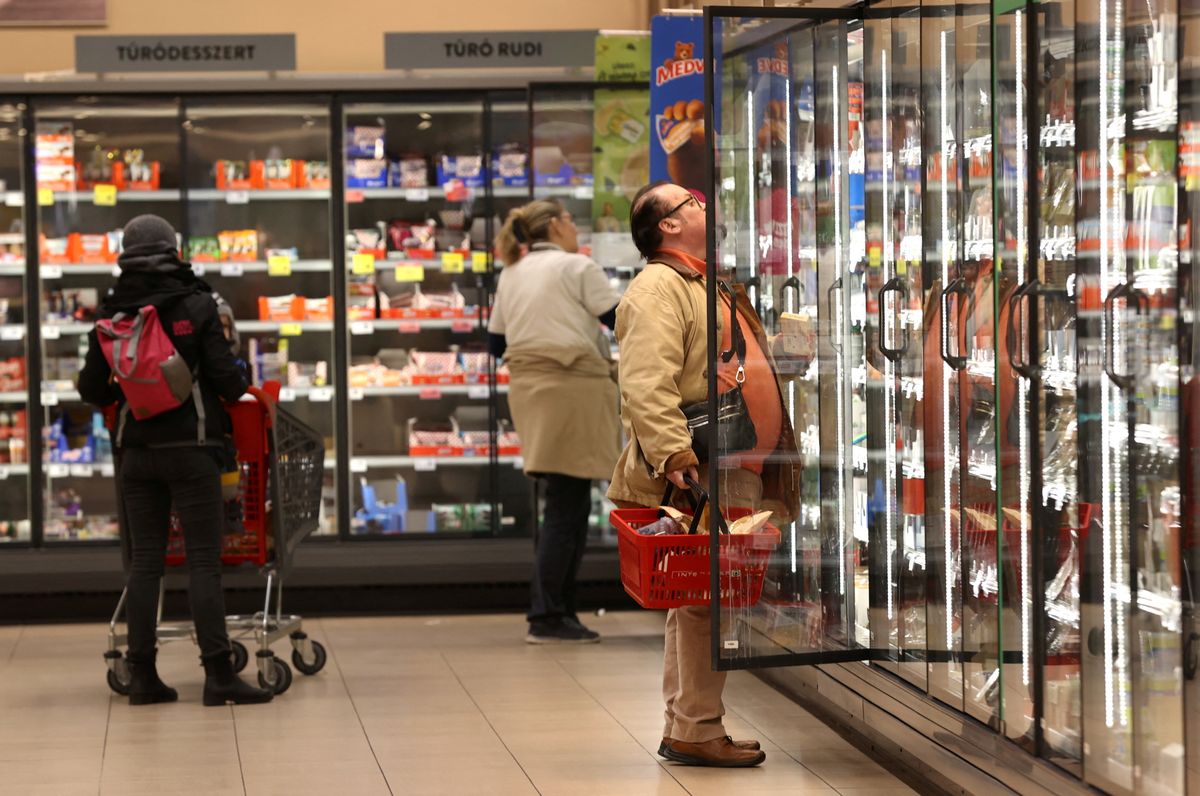 Customers shop at a supermarket in Budapest