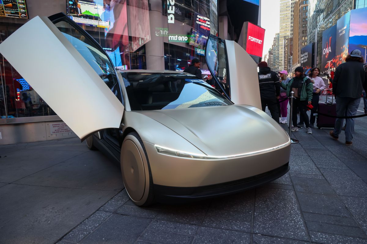 Tesla Showcases Optimus Robot And Cybercab At Nasdaq Marketsite
