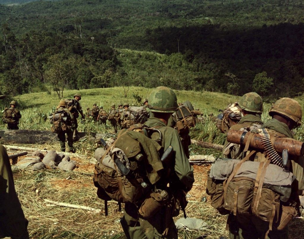 Soldiers descend the side of Hill 742, five miles northwest of Dak To, Vietnam