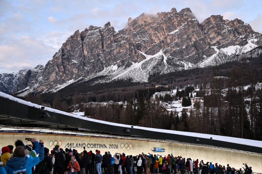 Italy's Dominik Fischnaller competes in the luge men's singles run 3 at Cortina Sliding Centre during the Milano Cortina 2026 Winter Olympic Games in Cortina d'Ampezzo on February 8, 2026. (Photo by Marco BERTORELLO / AFP)