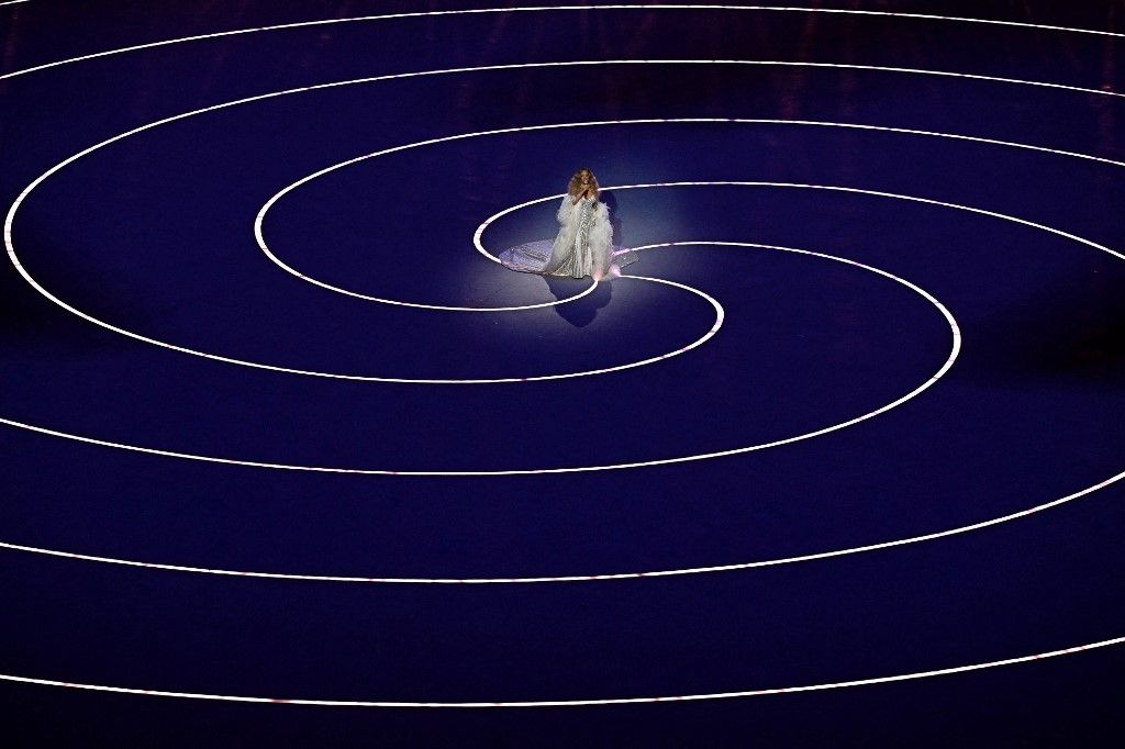 US singer Mariah Carey performs during the opening ceremony of the Milano Cortina 2026 Winter Olympic Games at the San Siro stadium in Milan, northern Italy, on February 6, 2026. (Photo by Gabriel BOUYS / AFP)