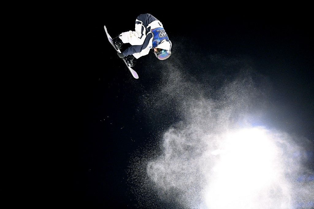 Japan's Taiga Hasegawa competes in the snowboard men's big air qualification run 2 during the Milano Cortina 2026 Winter Olympic Games at Livigno Snow Park, in Livigno (Valtellina), on February 5, 2026. (Photo by Kirill KUDRYAVTSEV / AFP)