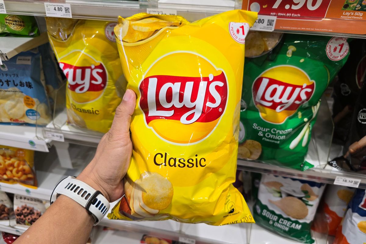 pepsico Penang,,Malaysia,–,May,12,,2024:,A,Hand,Holding,A