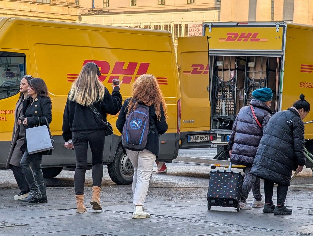 DHL Vans In The City Center Of Munich