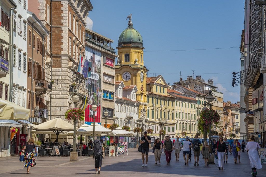View of baroque style City Clock Tower and shops on the Korzo, Rijeka, Croatia, Europe