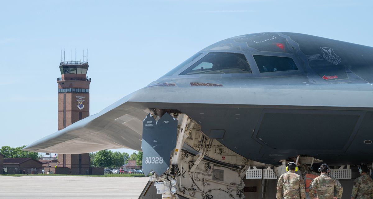 Airmen,Assigned,To,The,393rd,Bomber,Generation,Squadron,Unload,Cargo