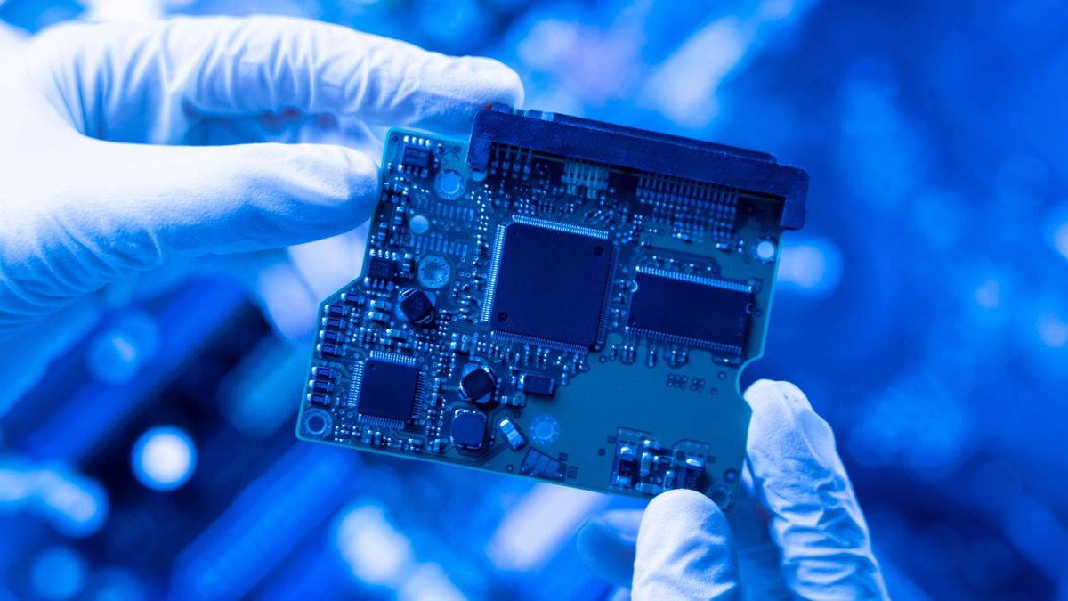 Qualcomm,Laboratory,Worker,Hands,Holding,New,Circuit,Board,,Digital,Ai,Chip