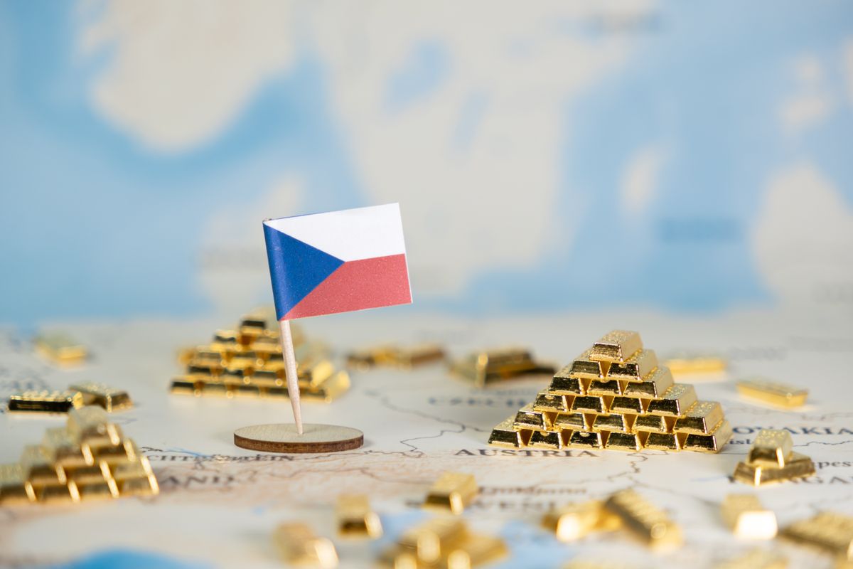 Czech,Republic,Flag,On,A,Map,With,Gold,Bars,Highlighting arany Csehország