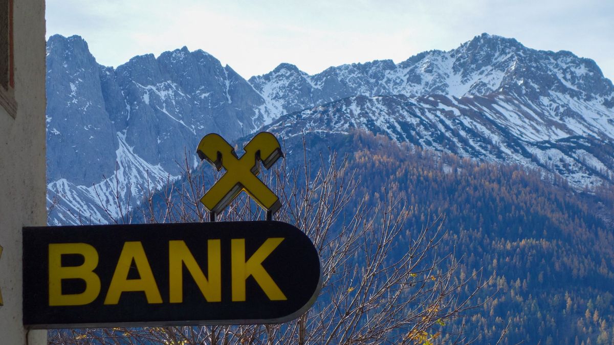 Raiffeisenbank Branch Against Snow-Capped Tyrolean Alps osztrák bankszektor