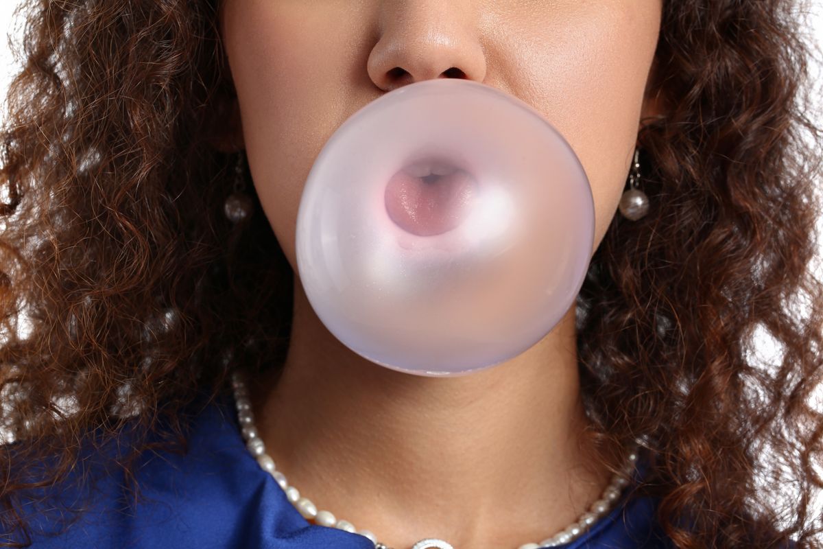 African-american,Woman,With,Chewing,Gum,,Closeup