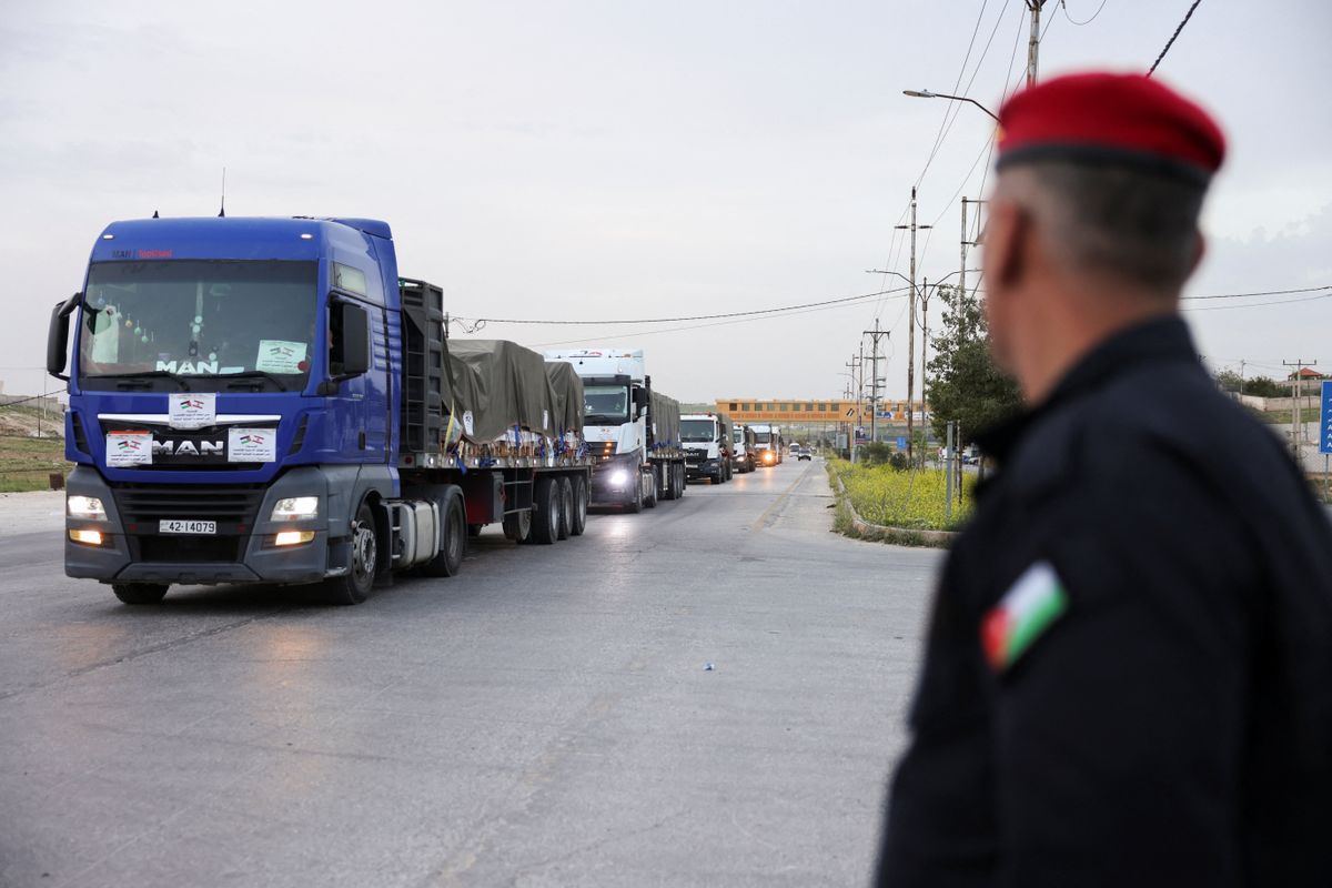 A convoy of Jordanian aid trucks heads from Amman to Beirut, Lebanon, carrying humanitarian aid, at the Jaber border crossing