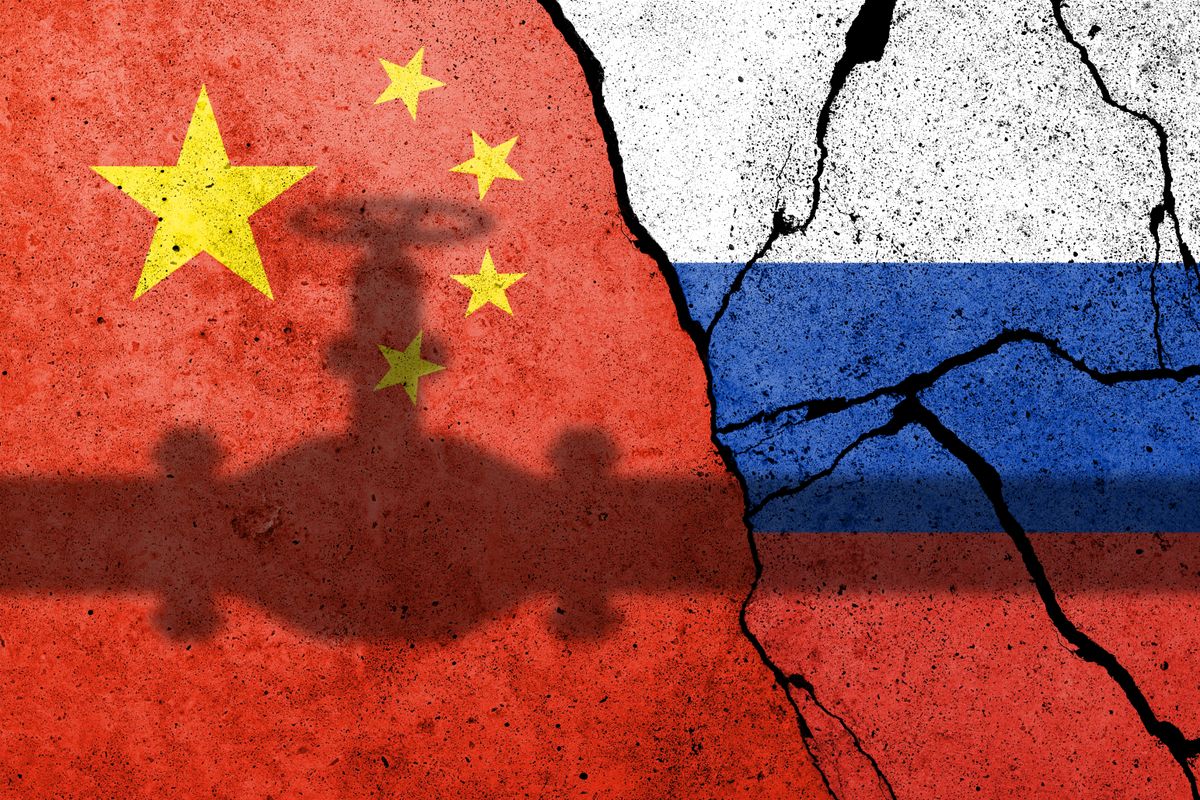 Flag,Of,China,And,Russia,Painted,On,A,Concrete,Wall. china russia oil kína orosz olaj