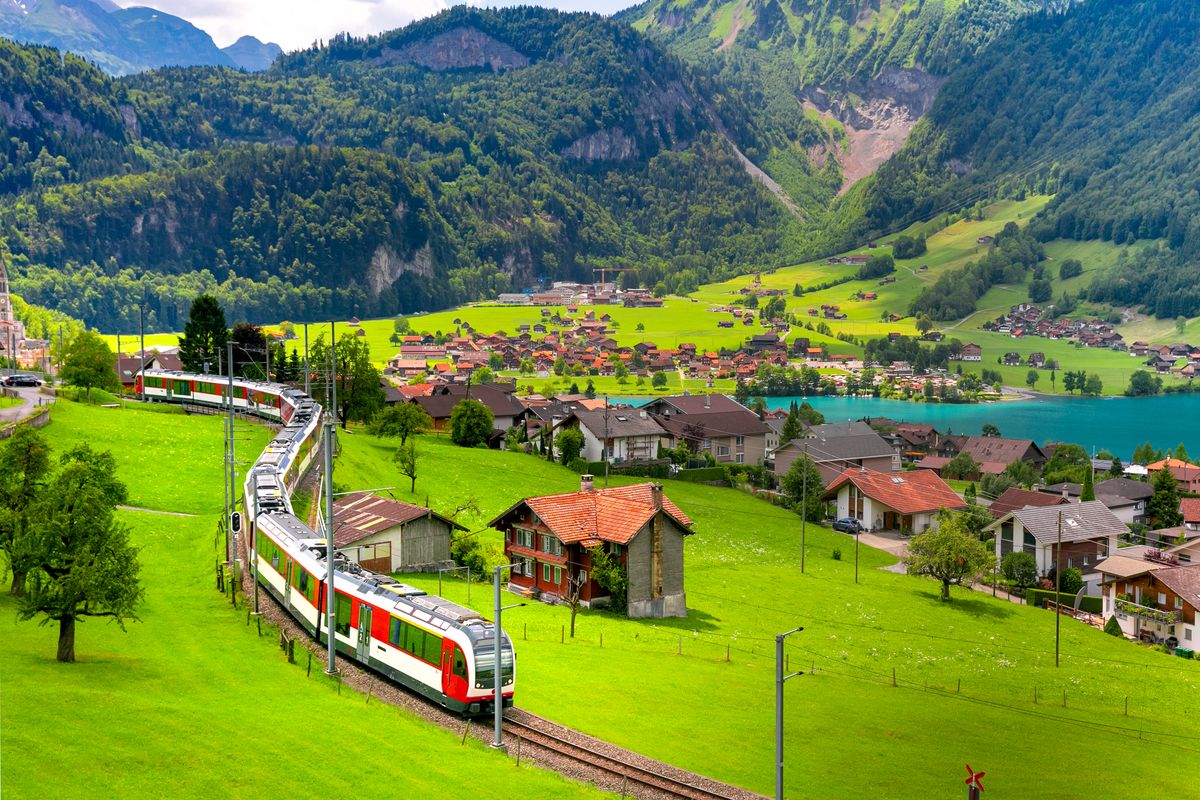 Famous,Electric,Red,Tourist,Panoramic,Train,In,Swiss,Village,Lungern,