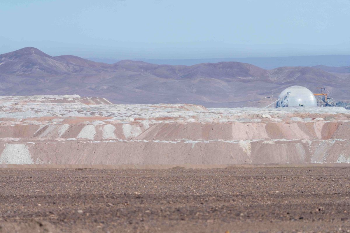 Covered dome at an open pit copper mine reduces dust pollution in the air.