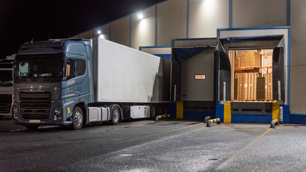 Several,Loading,Docks,With,Trucks,Backed,Up,And,An,Open