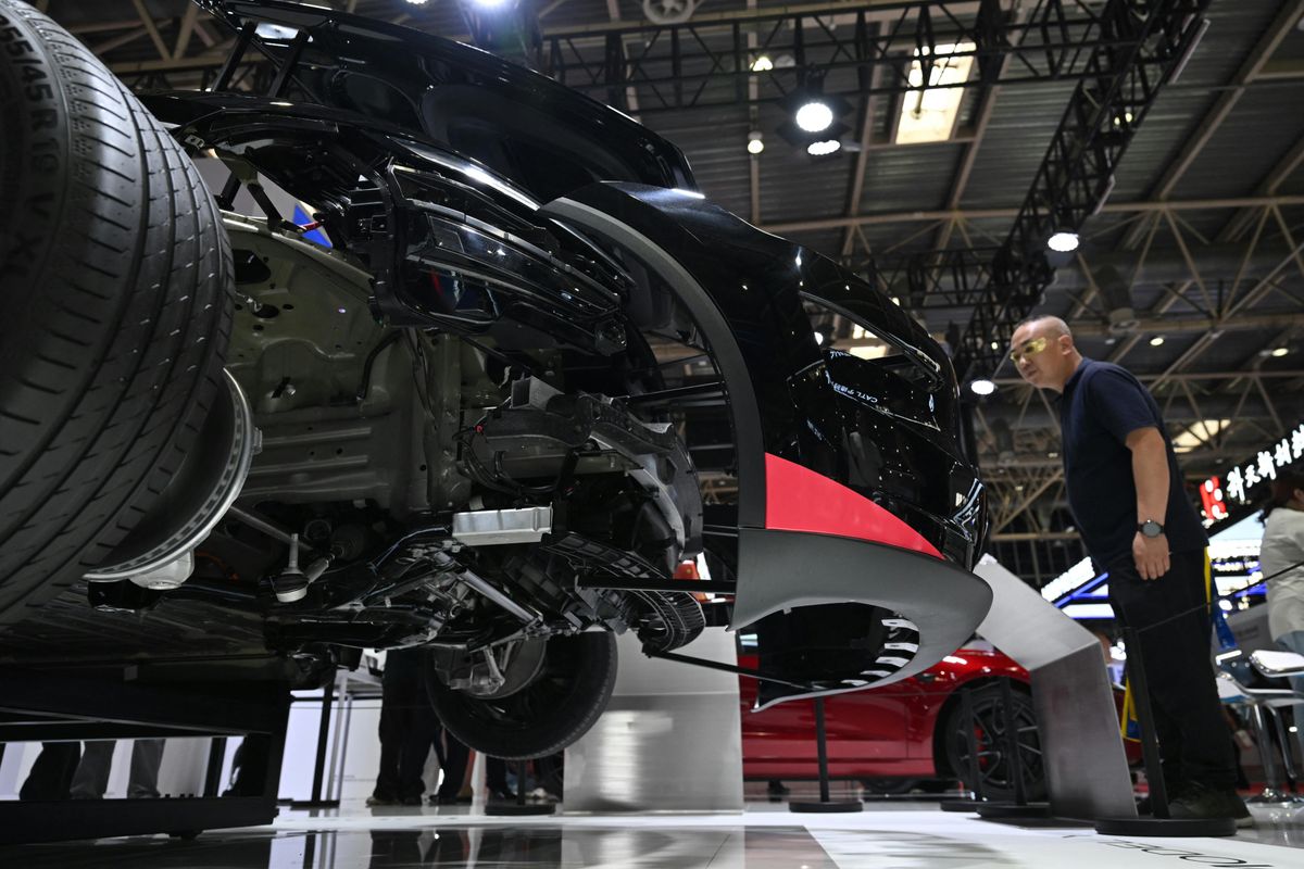 Tesla, Model Y's 'Explosion Parts' Draw Crowds at Beijing Supply Chain Expo