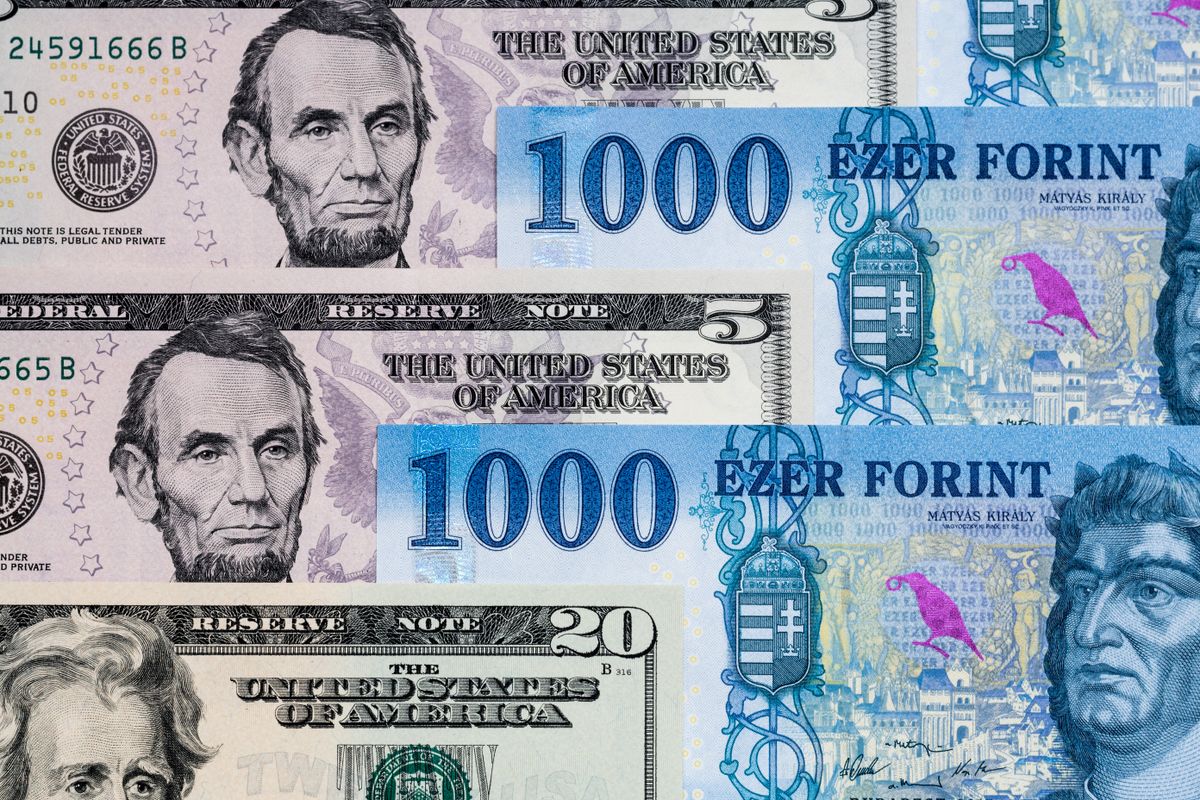 Us,Dollar,And,New,Hungarian,Forint,Banknotes,Placed,Neatly.,Dollar Forint Dollár