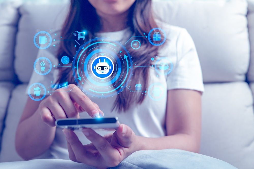 Woman,Using,Smartphone,With,Ai,Chatbot,Interface,For,Online,Shopping